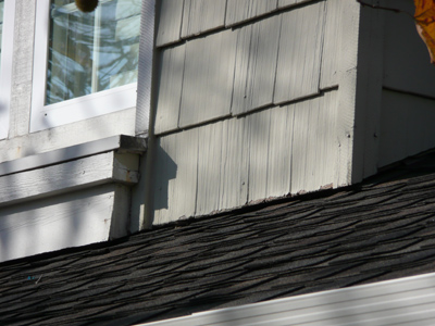 Roof meets wall with no flashing - Inferior Method that will lead to Deterioration